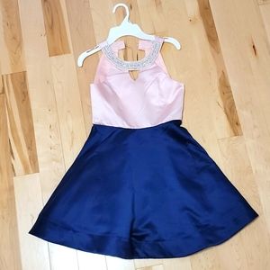 Girls size 8 pink and blue dress. Jewel embellishment on the neck line.